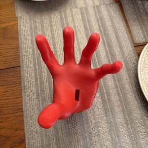 Red 3D Printed Hand “Thing” Life Size.  Watch and jewelry holder value~35